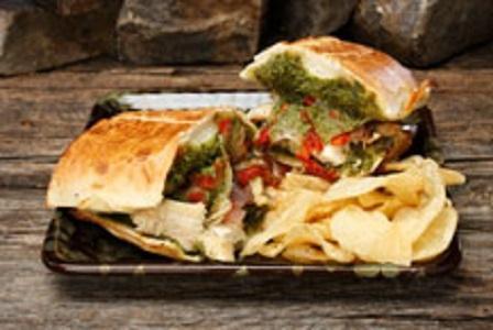 Chicken Pesto Sub · Grilled chicken with our classic pesto, fresh mozzarella, caramelized onions, sun-dried tomatoes and fresh basil.