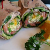 Breakfast Burrito · 2 scrambled eggs with green peppers, onions, avocado, cheddar cheese, raw spinach and tomato...