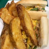 Chicken Cheesesteak · Thinly sliced all natural chicken sauteed with onions and finished with melted provolone che...