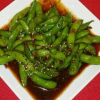 Spicy Garlic Edamame with Lime · Stir fried with minced garlic and soy sauce with sriracha sauce and lime. spicy.