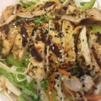Street Sesame Chicken Salad · Viet-style salad with lettuce, bell pepper, cucumber, tomato, carrot, cabbage and sesame see...