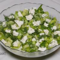 Green Salad · Lettuce, scallions, dill, feta served with pita and lemon - evoo dressing