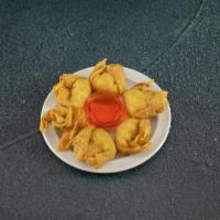 11. Crab Rangoon · Cream cheese, crabmeat and celery wrapped with wonton skins, then deep fried.