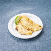 Corn Quesadilla · A grilled corn tortilla with melted cheese.
