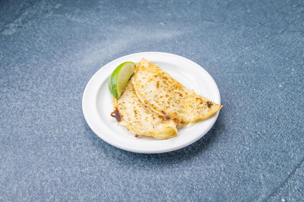 Corn Quesadilla · A grilled corn tortilla with melted cheese.