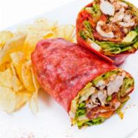 Veggie Heaven Wrap · Spinach, avocado, mushrooms, cucumber and tomatoes with sun-dried tomato pesto in a tortilla...