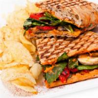 Roast Beef Panini · Roast beef and Brie cheese with choice of mayo or Dijon mustard. Served on ciabatta bread wi...