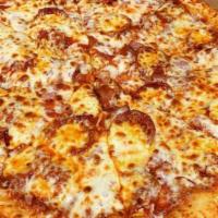 Meat Lover Pizza · Pepperoni, ground beef, Italian sausage, imported ham and Canadian bacon. Made from fresh do...