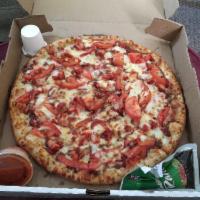 BBQ Chicken Pizza · Chicken, fresh tomatoes, BBQ sauce and mozzarella cheese. 