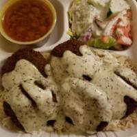 Falafel Platter with Rice · Made with fresh homemade white sauce and falafel, comes with basmati rice, seasoned chick pe...