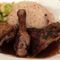 Jerk Chicken Meal · Chicken is seasoned with house made jerk seasoning then marinated and slow cooked over low h...