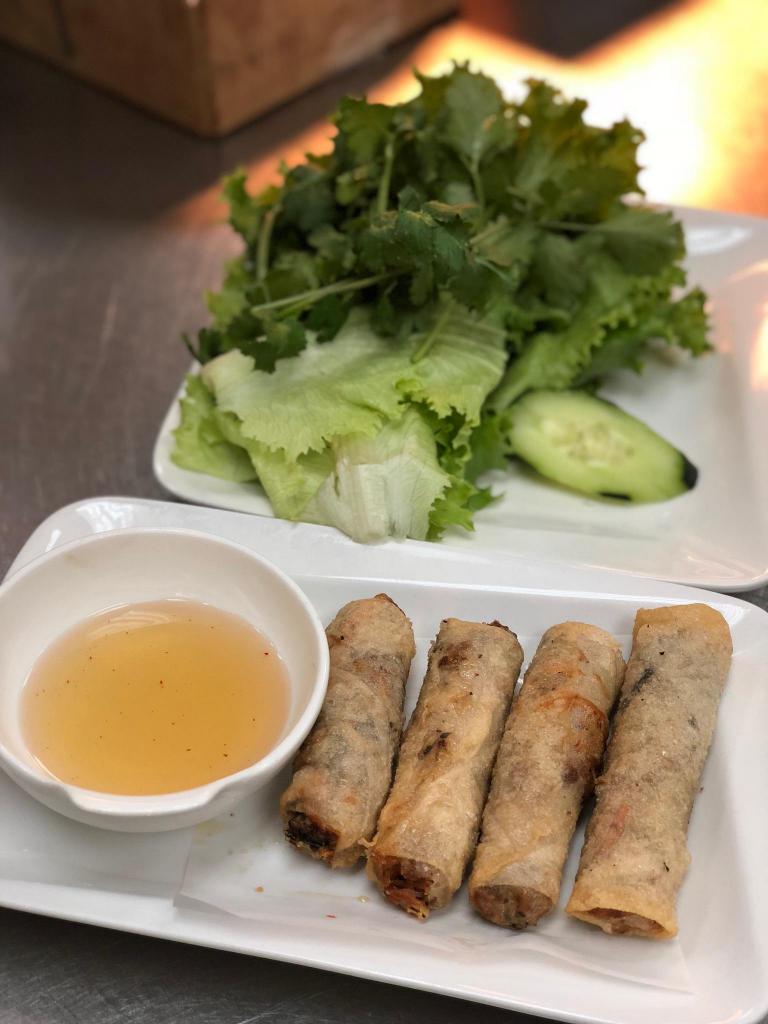 4 Pieces Vietnamese Egg Rolls · Pork, cabbage, carrot deep fried in a crispy rice wrap served with lettuce, cilantro and a side of fish sauce.