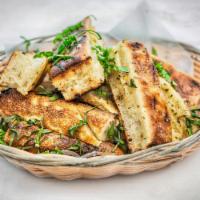 Garlic Breadsticks · 6 pieces. Ranch dressing served with breadsticks upon request. Add melted mozzarella for an ...
