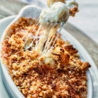 Mac and Cheese · Orecchiette in a creamy cheese sauce, baked with crispy toasted breadcrumbs. Add applewood s...