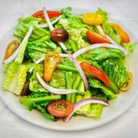 Garden Salad · Crispy romaine, tomato, red onion, green pepper. Vegan.