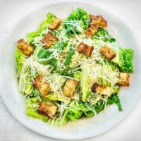 Caesar Salad · Crisp romaine, housemade croutons, freshly grated Parmesan. Served with Caesar dressing. Com...