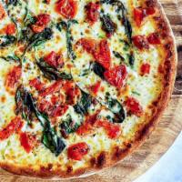 Gluten-Free Margherita Pizza · Mozzarella, tomatoes, fresh basil and olive oil. Tomato sauce is optional. Vegetarian.