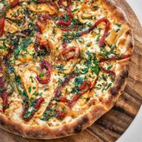 Spicy Pepper Chicken Pizza · Sliced chicken breast, roasted red peppers, caramelized onions, cilantro, oregano, hot red p...