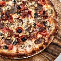 Amici's Combo Pizza · Pepperoni, meatballs, bacon, sauteed mushrooms and black olives.