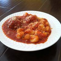 Gnocchi · Gnocchi in our homemade sauce and a meatball, mozzarella cheese and grated Pecorino Romano c...