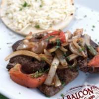 Higado Enbebollado · Grilled beef liver topped with sauteed onions.
