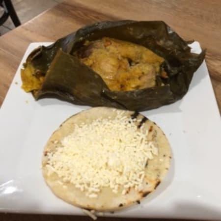 Tamales Breakfast · A corn “cake” filled with chicken, pork, potatoes, peas & carrots all wrapped in a banana leaf and cooked by hot steam.
All breakfasts are served with ‘arepa paisa’ topped with white cheese, hot chocolate or coffee!