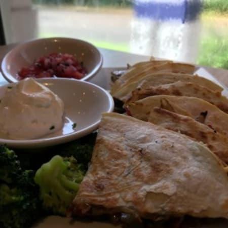 Quesadilla de Carne y Champinones · Grilled steak, sauteed with mushrooms, onions, peppers and mixed cheese in a grilled flour tortilla. Served with pico de gallo and sour cream.
