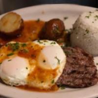 Bistec a Caballo · 10 oz. grilled center cut NY strip steak with Colombian creole sauce topped with 2 fried egg...
