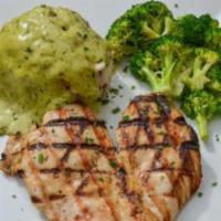 Pollo Con Salsa de Cilantro · Wood grilled chicken breast (10oz). Served with mashed potato loaded with corn and melted ch...
