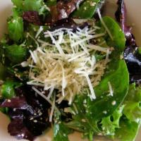 Sesame Fields Salad · Organic field greens tossed with our herbal vinaigrette, toasted sesame seeds and fresh Parm...