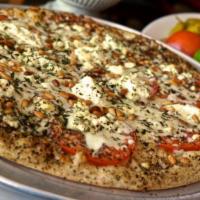 4 Tenors Pizza · A layer of fresh sliced tomatoes instead of sauce, mozzarella, provolone, ricotta, Gorgonzol...