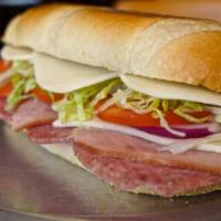 Club Sub Sandwich · Ham, turkey and bacon with provolone, lettuce, tomatoes, onions and mayonnaise. Recommended ...