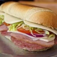 Turkey Breast Sandwich · Smoked turkey breast, provolone, lettuce, tomatoes, onions and mayonnaise.