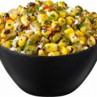 Corn Salad · Roasted Corn & Peppers Tossed with Pumpkin Seeds, Feta Cheese, Cilantro and White Shallot Vi...
