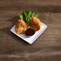 2 Vegetable Samosa · Triangular shaped, savory filled with spicy minced vegetable. Served with organic seasoning ...