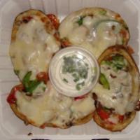 Pizza Skins · Add any 3 of our pizza toppings to complete a potato skin pizza. Cheese, sour cream and chiv...