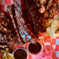 Family PACS · Pork, Angus, chicken and sides. BBQ bundles for just 2 or the whole crew: Pulled pork, smoke...