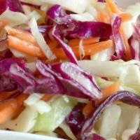 Vinaigrette Slaw · Shredded red and green cabbage and carrots tossed in house vinaigrette.