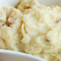 Garlic Mashed Potatoes · Russets, cream & garlic all mashed into something beautiful.