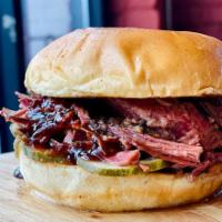 Angus Brisket Sandwich · House pickles, Memphis style BBQ sauce #18. served with 2 sides.