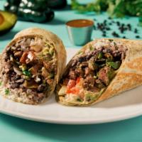 The Fajita Burrito · Sauteed peppers and onions, cilantro lime rice, black beans, vegan chipotle crema, guacamole...