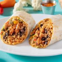 Guiltless Burrito · Spanish cauliflower rice, black beans, tri-color peppers, jalapeño cabbage & vegan chipotle ...