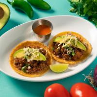Barrio Taco · Roasted tomato salsa, avocado, diced red onion, and cilantro. Chef recommends beef chorizo a...