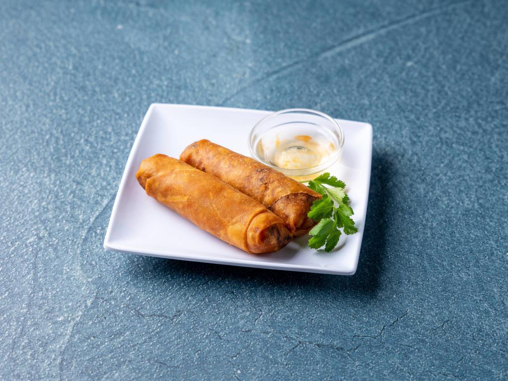 Fried Spring Roll · Cabbages, celery, carrots and glass noodles stuffed in a spring roll and served with plum sauce.