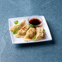 6 Pieces Steamed Dumpling · Chicken, vinaigrette soy sauce. Add extra sauce for an additional charge.
