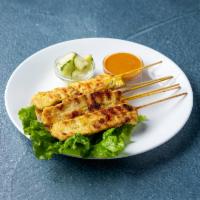6 Pieces Chicken Satay · Skewers of grilled marinated chicken with a mixture of spices, served with a cucumber salad ...
