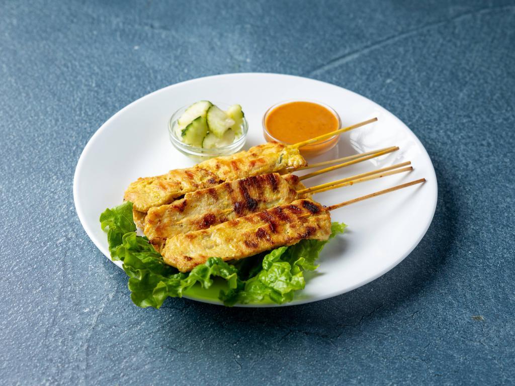 4 Pieces Chicken Satay · Marinated grilled chicken, peanut sauce and cucumber salad. Add extra sauce or extra cucumber salad for an additional charge.
