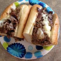 Philly Cheese Steak Sub · American cheese, sautéed onions and mayo.