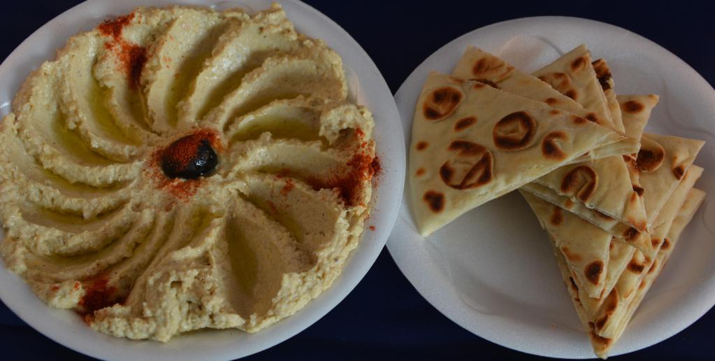 Hummus   (Vegan) · Homemade ground chickpea spread. Served with pita bread.