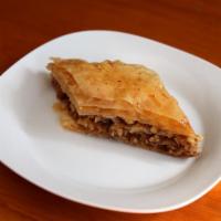 Baklava · Sweet pastry made of layers of filo filled with chopped walnuts and sweetened and held toget...